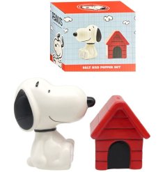 Ceramic salt and pepper shaker set featuring Snoopy and his iconic red doghouse from the Peanuts comic strip.