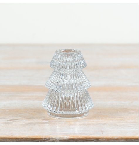 Add a refined festive glow to your seasonal display with this charming tree-shaped glass holder