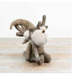 Featuring a charming compact design, this cute holiday character is dressed in a warm knit outfit with a plaid scarf 