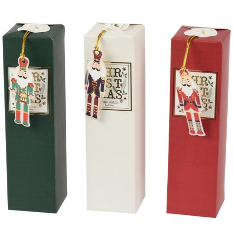 Bring holiday cheer with the Nutcracker Diffuser Glass, available in white, red, or green.