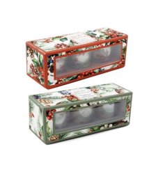 Bring holiday cheer with the warm glow of Xmas Berries Votives in your home.