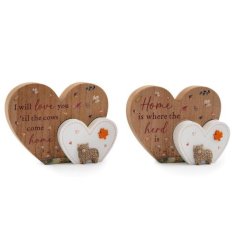 Adorable double heart ornament featuring a cute cow design.