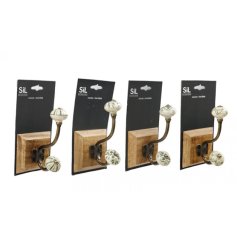 Charming single green hook mounted on a natural wood base.