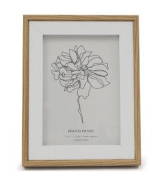 Elevate your space with this elegant light wood and white frame