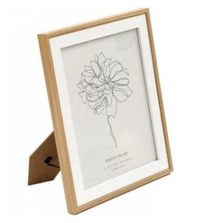 Add a touch of elegance with this Light Wood & White Frame