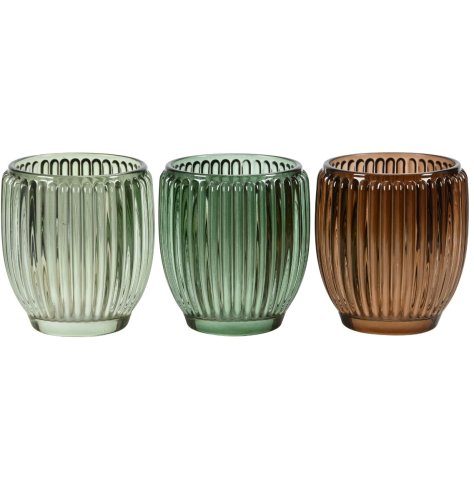 Bring elegance to your space with this striking green glass candle holder.