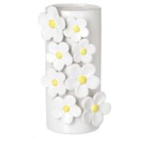 Delicate charm meets timeless style in this White Floral Ceramic Vase