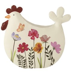 Add a touch of countryside charm to your spring décor with this vibrant floral metal hen