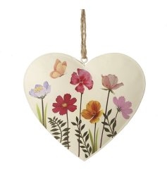 Bring vibrant charm and elegance to your space with this Floral Metal Heart Hanger.
