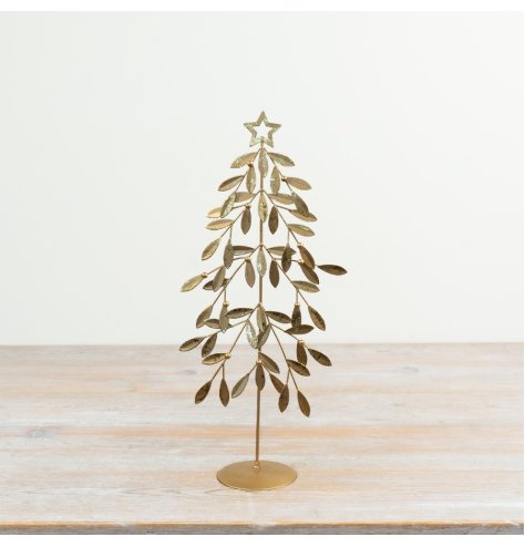 Stylish gold-hued metal tree with intricate leaves and star embellishments