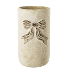 Elevate your decor with our elegant White Bow Cement Planter.