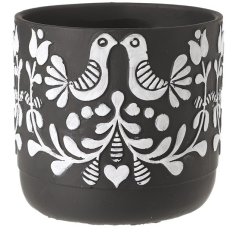 Add rustic charm to your space with the Folk Art Bird Design 