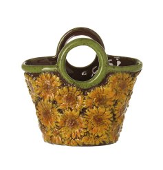 Add a burst of sunshine to your space with this stunning sunflower vase.