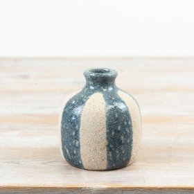 Bring coastal elegance home with this chic Blue and White Ceramic Striped Vase.