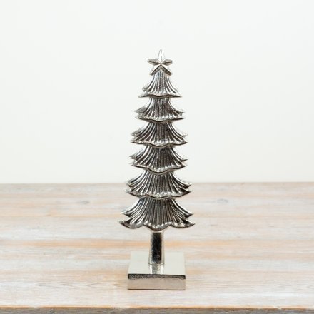 elegant silver aluminium tree ornament with a stable base and charming star topper
