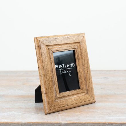 a charming wooden picture frame 