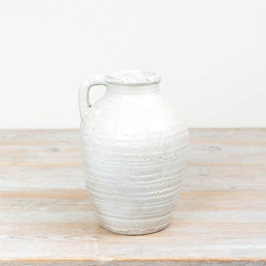 Stylish textured jug vase, ideal for showcasing your favorite flowers beautifully.