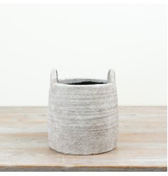 a charming natural planter with handy handles 