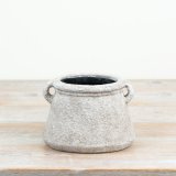 a charming rustic planter finished in a distressed look 