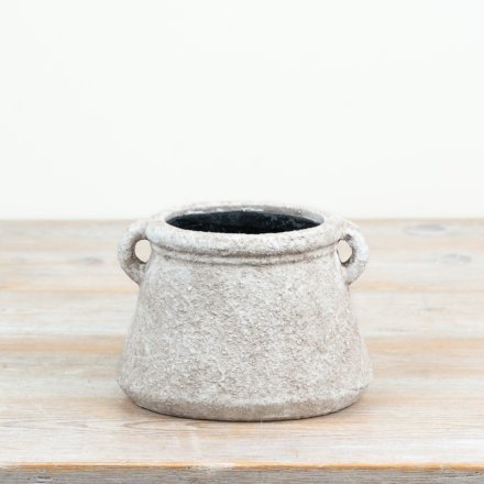a charming rustic planter finished in a distressed look 