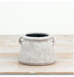 a charming rustic planter finished in a distressed look 