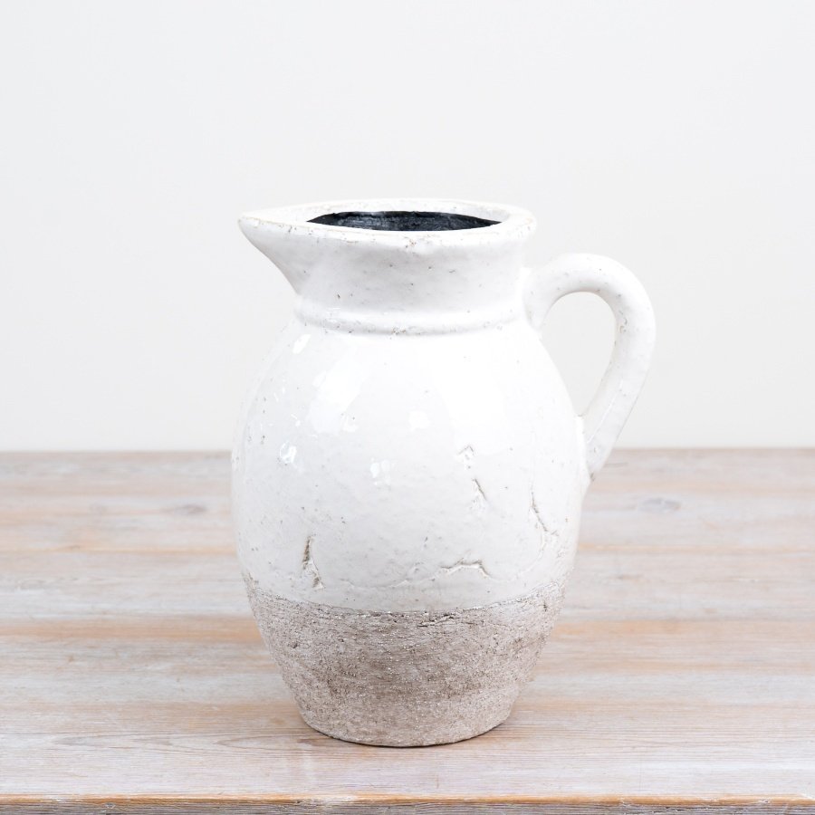 Stylish ceramic vase combining textured and glossy two-tone finishes for subtle elegance