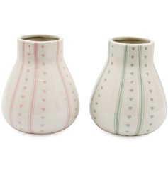 Delightful pastel striped bud vase adorned with a charming heart motif perfect for spring display
