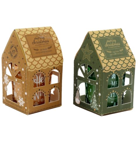 Delightful seasonal candles adorned with detailed tree and snowflake patterns