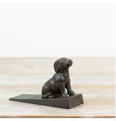 Charming and sturdy dog-shaped cast iron door stopper in a natural rustic finish