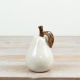 Elegant glazed white ceramic pear ornament perfect for stylish home décor