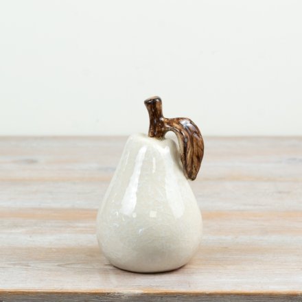 Elegant glazed white ceramic pear ornament perfect for stylish home décor