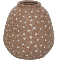 Rustic spotty vase crafted from ceramic and cement for natural charm