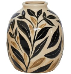 Glossy glazed vase inspired by nature's beauty with elegant leafy design