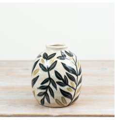 Glossy glazed vase inspired by nature's beauty with elegant leafy design