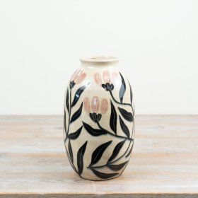A chic glazed ceramic vase adorned with leaf patterns