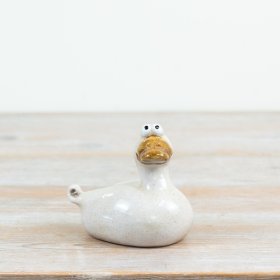 a delightful plump duck figure full of character