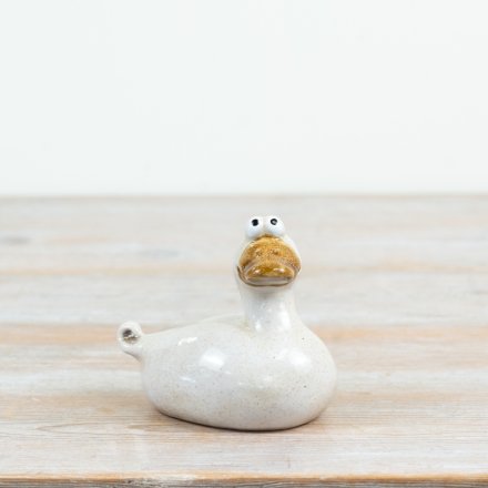 a delightful and plump duck ornament with character