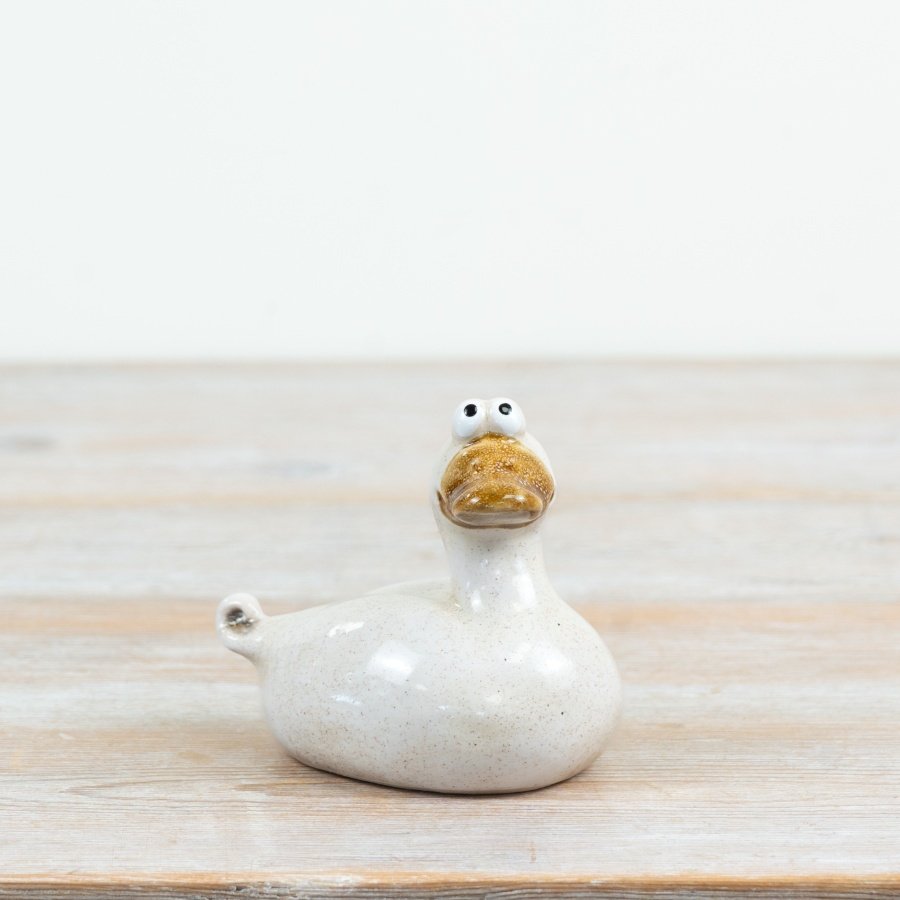 a delightful plump duck figure full of character