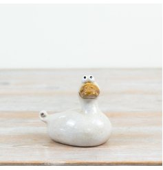 a delightful and plump duck ornament with character