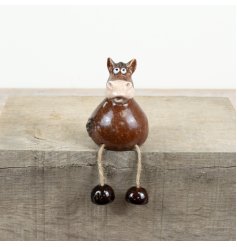 Add charm to any nook with this delightful animal figurine for shelves or mantels