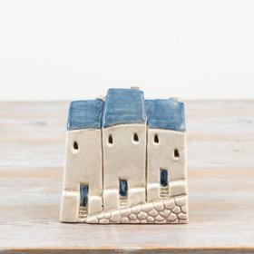 Add a cosy glow with this rustic blue windlight inspired by coastal homes