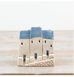 Brighten your room with a quaint coastal-inspired rustic blue windlight