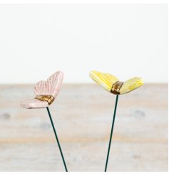 Brighten your garden with these delightful butterfly stakes in lively yellow and gentle pink