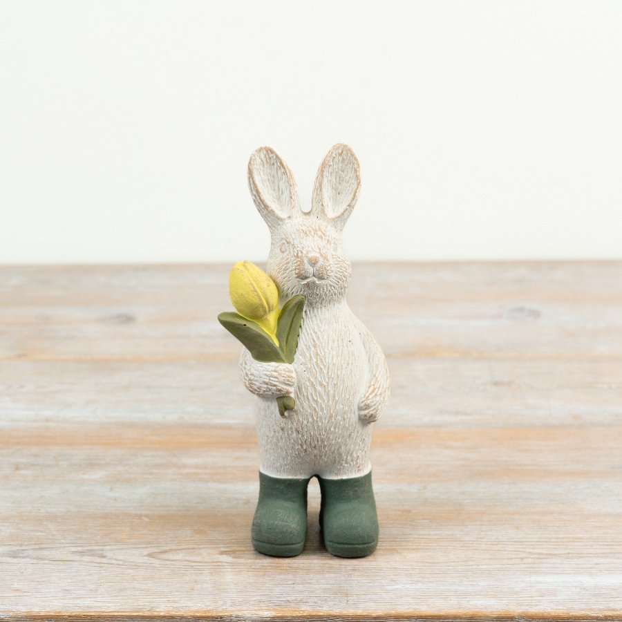 Delightful bunny decoration featuring a tulip and cheerful yellow boots