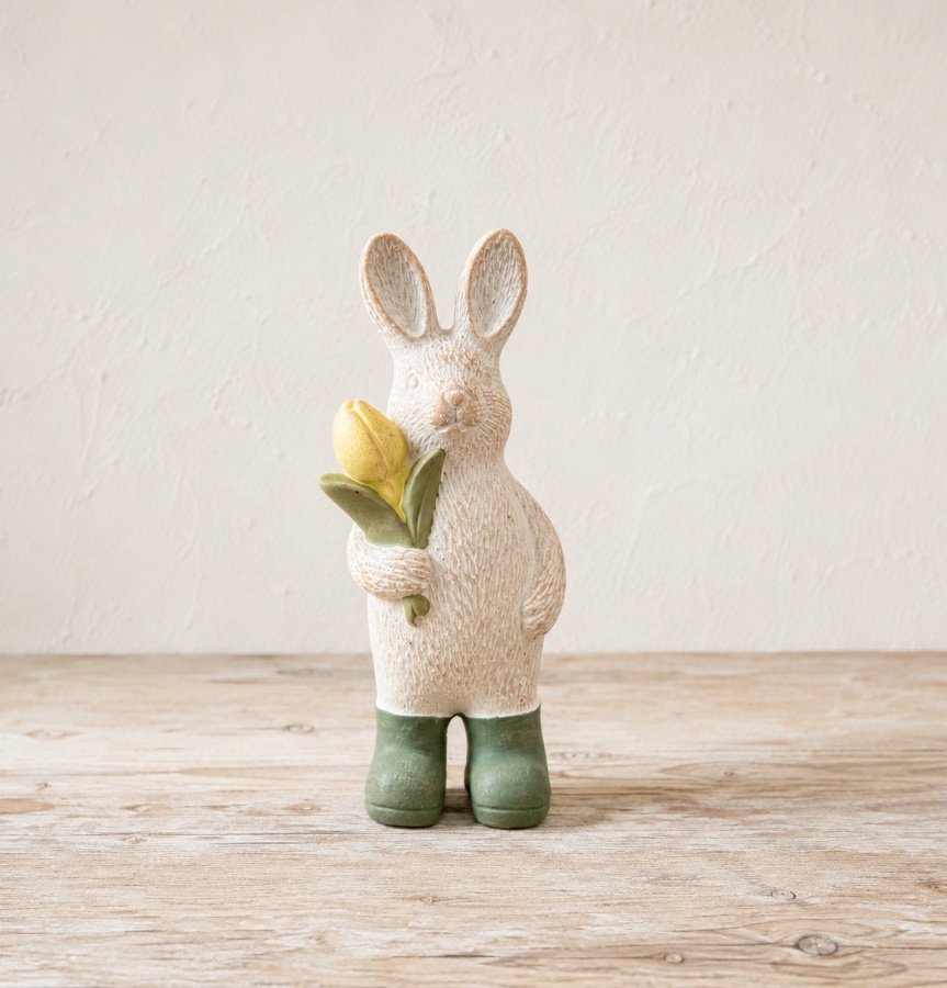Delightful bunny decoration featuring a tulip and cheerful yellow boots