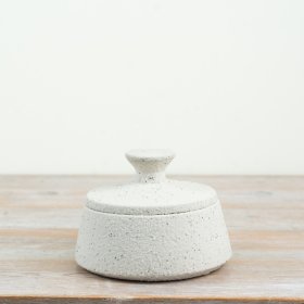 a stylish white storage jar with convenient lid ideal for organising your small bits and bobs