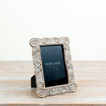beautiful shabby chic frame with intricate Baroque-inspired carvings