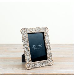 beautiful shabby chic frame with intricate Baroque-inspired carvings