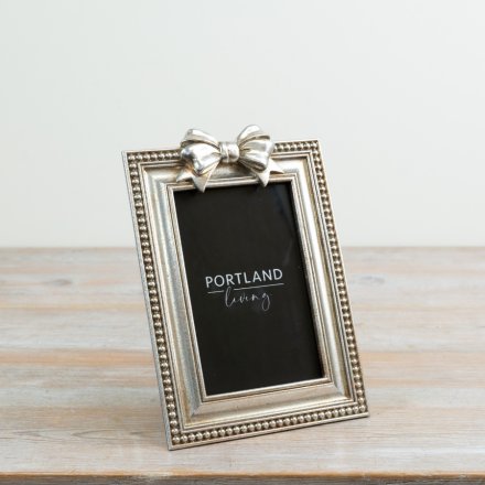 a stylish silver bow style photo frame 