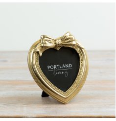a charming bow frame with a cute bow at the top.